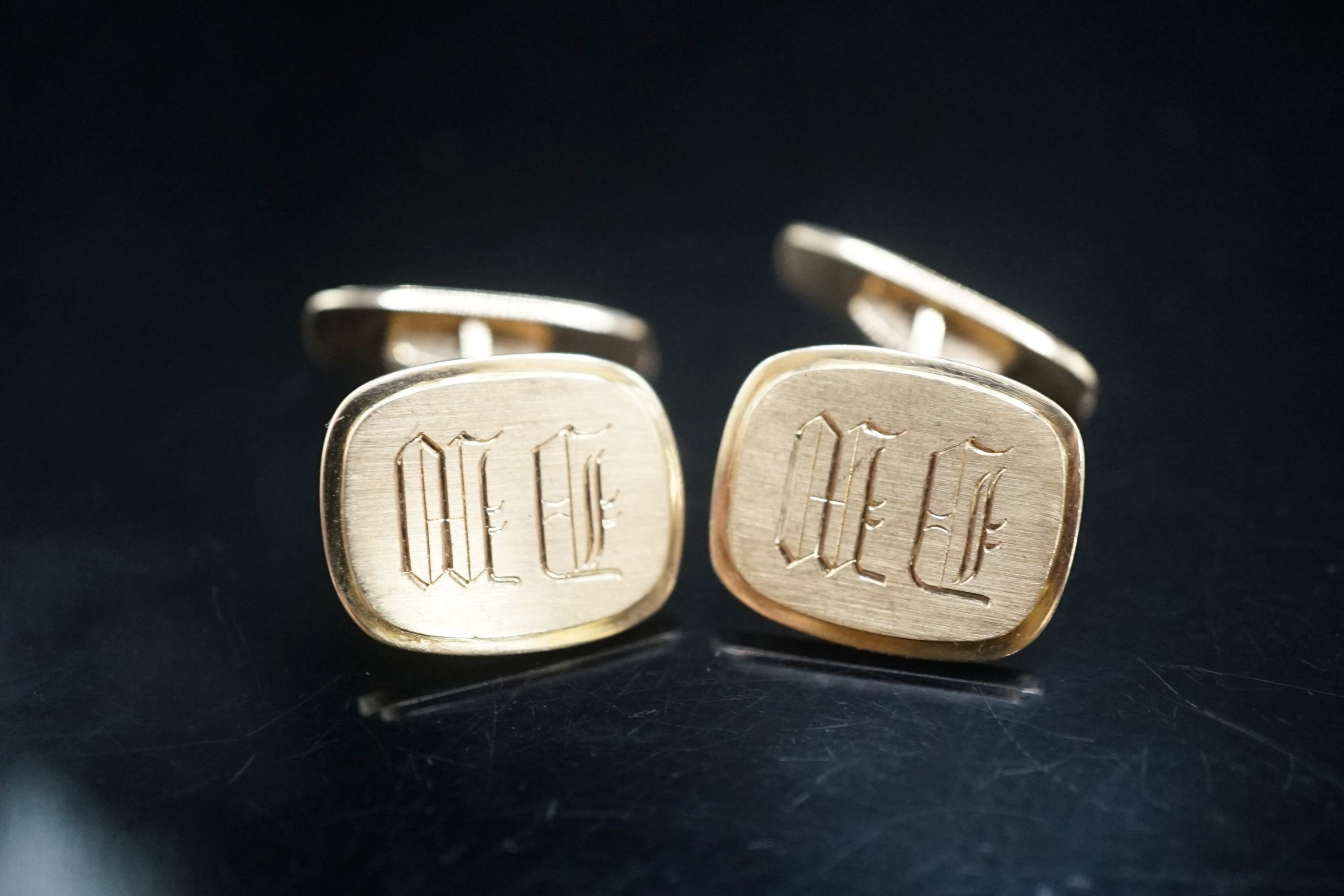 A pair of 585 yellow metal cufflinks, with engraved initials, 18.2 grams.